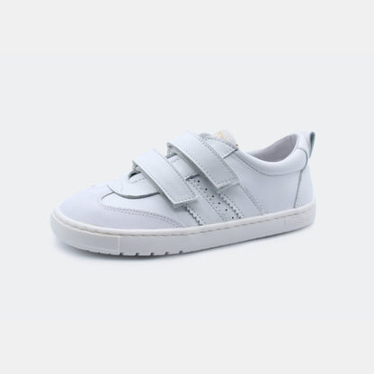 Zapatillas Marea en color Blanco, calzado barefoot para niños de pies libres, flexibles, ergonómicas y ligeras, ideales para el desarrollo natural del pie infantil. 💡 Ideal para todo tipo de empeines.